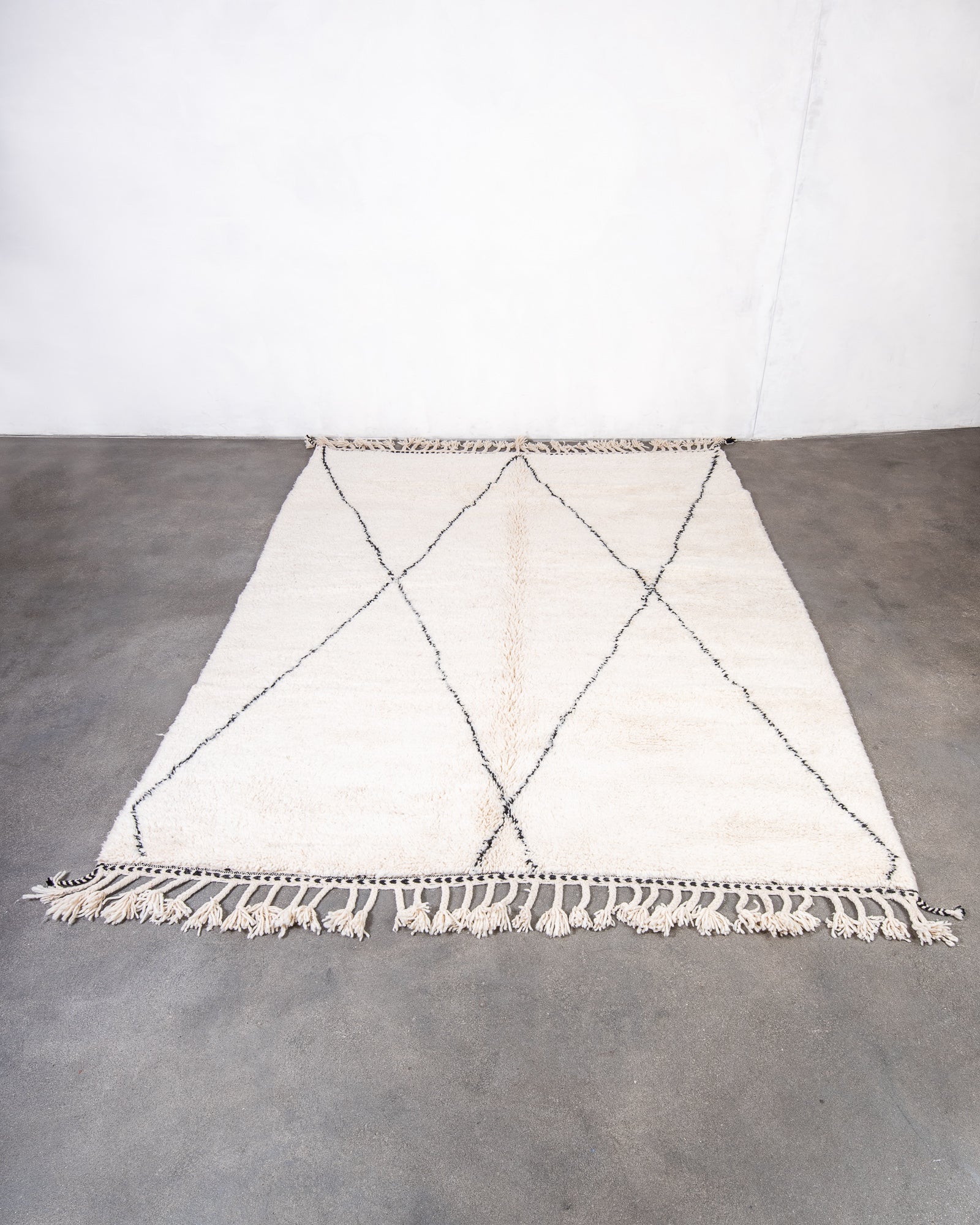 Modern, designer, handcrafted Berber rug from Morocco. Beniourain carpet with beautiful colours and patterns and fluffy wool texture.